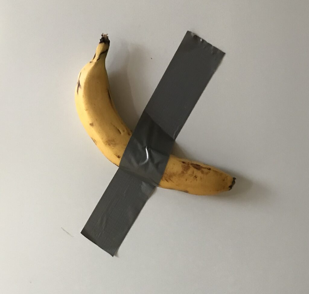 Banana_duct_taped_to_fridge_as_a_reminder_to_eat_less_meat-1024x975 Inteligencia Artificial vs humanos, ¿El fin del arte?